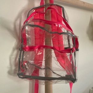 Clear backpack with pink straps